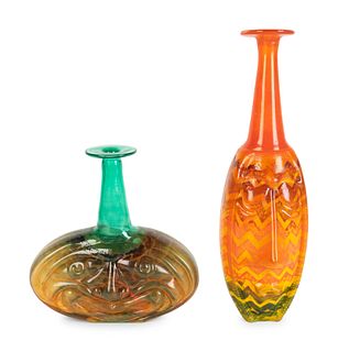 Two Kosta Boda Glass Face Vases
Heights 15 1/4 and 9 1/4 inches.