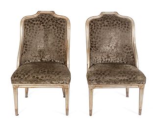 A Set of Four Neoclassical Style Silvered Rattan Barrel-Back Chairs
Height 42 1/2 x width 24 1/2 x depth 22 inches.