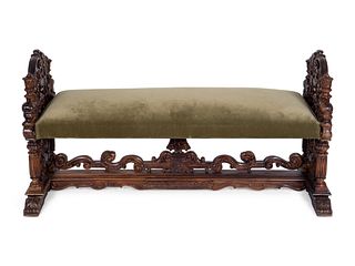 A Renaissance Style Velvet-Upholstered Walnut Bench
Height 30 x length 57 1/2 x depth 24 inches.