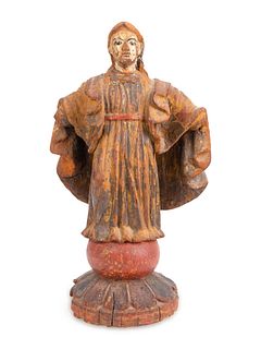 A Spanish Colonial Carved and Painted Figure of a Saint
Height 16 inches.