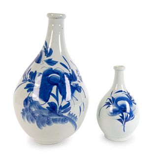 Two Korean Style Blue and White Porcelain Vases
Height of taller 15 1/4 x diameter 9 inches.