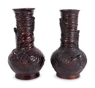 A Pair of Japanese Patinated Bronze Vases
Height 8 1/4 inches.