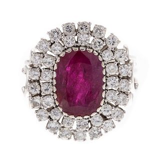A 3.00 ct Ruby & Diamond Halo Ring in 14K