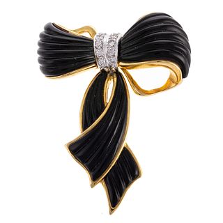 A Ladies Black Onyx Bow with Diamonds in 14K