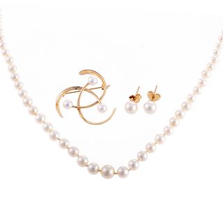 A Collection of Pearl Jewelry in 14K Gold