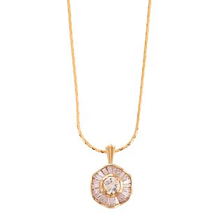 A Diamond Pendant in 18K Hanging on 14K Chain