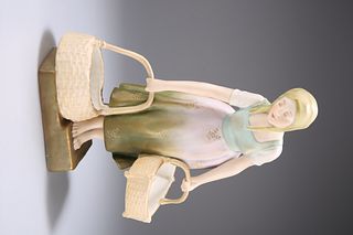 AN ERNST WAHLISS POTTERY FIGURE OF A GIRL, CIRCA 1900, mode