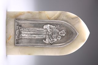 A CONTINENTAL WHITE-METAL PLAQUE, CIRCA 1900, the pointed a