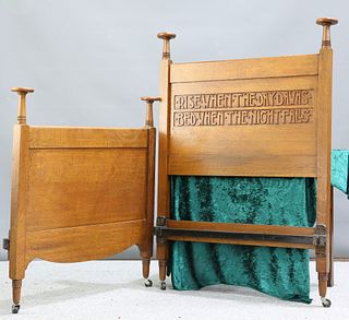 A FINE ARTS AND CRAFTS OAK BED, the headboard carved with t