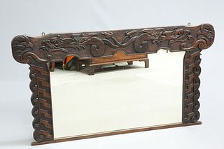 A LARGE ARTS AND CRAFTS CELTIC REVIVAL OAK OVERMANTEL MIRRO