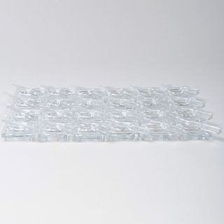 Twenty-Four Baccarat Glass Knife Form Rests and Twenty-Four Butter Pats