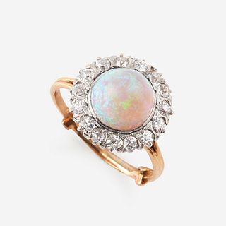 An opal, diamond, and eighteen karat gold ring,
