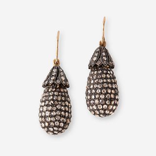 A pair of diamond and silver topped eighteen karat gold earrings,