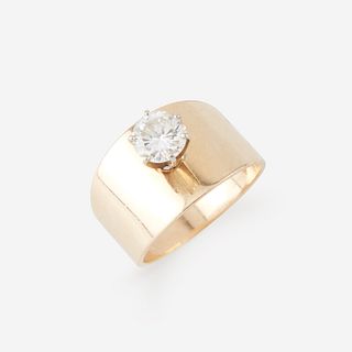 A fourteen karat gold and diamond ring,