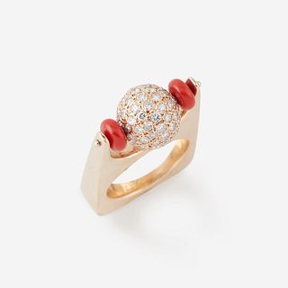 A fourteen karat gold, diamond, and coral ring,