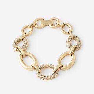 A eighteen karat gold and diamond bracelet,