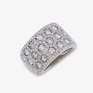 A diamond and fourteen karat white gold ring,