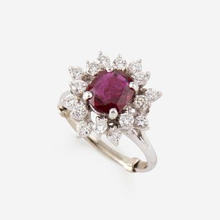 A ruby, diamond, and fourteen karat white gold ring,