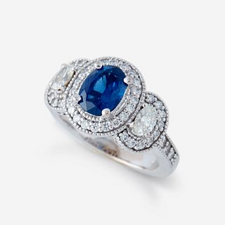 A sapphire, diamond, and eighteen karat white gold ring,