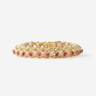 An eighteen karat gold and ruby bracelet, Cartier,