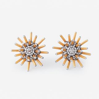 A pair of eighteen karat gold and diamond earrings,