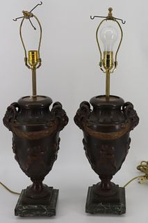 An Antique Pair Of Patinated Metal Urn Form Lamps