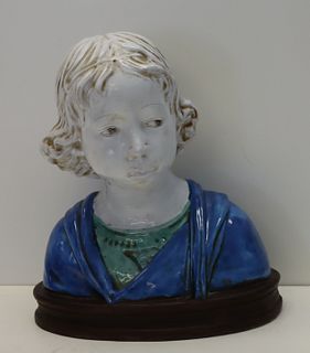 Unsigned Glazed Terracotta Bust of a Child.