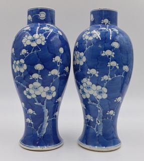 Pair of Chinese Blue and White Prunus Vases.