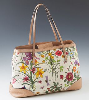 Gucci White MC Canvas Floral Shoulder Bag, with tan leather accents and magnetic closure, the interior of the bag lined in beige canvas with a side zi