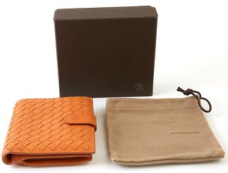 Bottega Veneta Orange Bifold Wallet, the calf leather intrecciato with gold accents, opening to two card holders, three bill compartments, and a side 