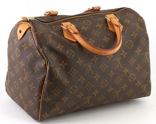 Louis Vuitton Brown Monogram Coated Canvas 30 Speedy Handbag, with golden brass hardware and vachetta leather handles, opening to a brown canvas inter
