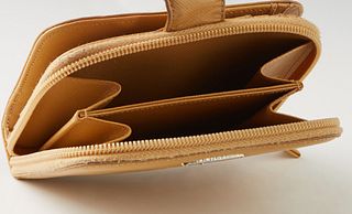 Prada Tan Leather Compact Zip Wallet, with sliver hardware and a snap closure, the interior lined in matching tan leather with numerous card slots and