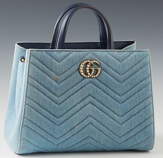 Gucci Blue Matelasse Denim Pearl Embellished GG Shoulder Bag, with blue leather accents and gold tone hardware, the interior of the bag lined in silk 