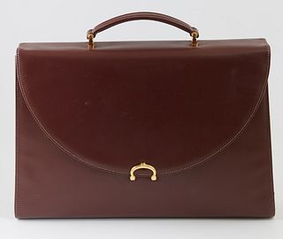 Cartier Brown Calf Leather Briefcase, with a single leather handle and gold hardware, the interior of the bag lined in a red monogram silk, with a lar