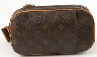 Louis Vuitton Brown Monogram Coated Canvas Pochette Gange, the adjustable brown canvas strap with vachetta leather and brass hardware, the brass zippe