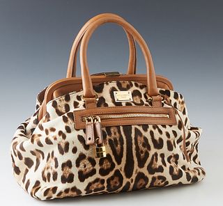 Dolce and Gabbana Leopard Calfskin Satchel, with brown leather accents and gold tone hardware, the triple compartment interior of the bag lined in dar