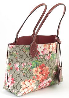 Gucci Blooms Supreme Beige Coated Canvas Reversible Tote Shoulder Bag, the exterior with a floral print and plum colored leather and luggage tag, open