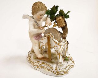 A Meissen Porcelain Putto Figurine