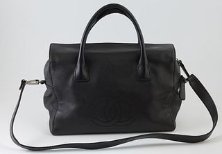Chanel Black Small Grained Leather Front Logo Handbag, c. 2005-2006, with ruthenium hardware and magnetic flaps over two open compartments on either s