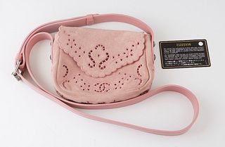 Chanel Pink Suede Mini Messenger Bag, c. 2015, with silver hardware and pierced floral stitching decoration, the envelope flaping opening to a matchin
