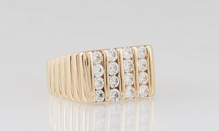 Lady's 14K Yellow Gold Dinner Ring, with four vertical rows of four 7 point round diamonds, on a tapering ribbed band, total diamond wt.- app. 1.12 ct