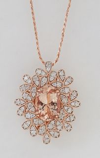 14K Rose Gold Pendant, with an oval 4.95 ct. morganite, atop a pierced diamond mounted border of round diamonds, on a twisted link, 14K rose gold chai