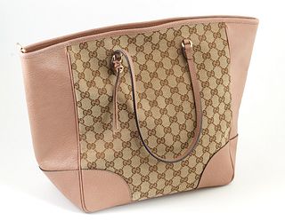 Gucci Antique Pink Grained Leather and Beige Monogrammed Canvas Bree Tote Shoulder Bag, the exterior with gold hardware and one Gucci charm and leathe