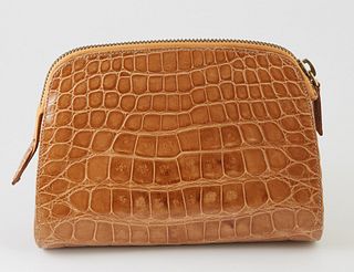 Prada Alligator Pouch, with gold hardware, the interior of the bag lined in dark brown Prada monogram canvas, with a side zipper pouch.