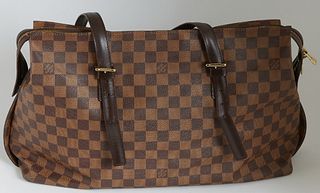 Louis Vuitton Brown Damier Ebene Coated Canvas Chelsea Shoulder Bag, the two adjustable straps with golden brass hardware, opening to a red canvas int