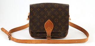 Louis Vuitton Brown Monogram Coated Canvas MM Cartouchiere Shoulder Bag, the adjustable vachetta leather strap with brass hardware, the flap with vach