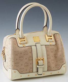 MCM Beige Monogram Canvas Handbag, with white leather trim and gold tone hardware, the interior of the bag with silk monogram lining, one side with zi