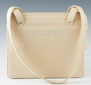 Chanel Beige Leather Shoulder Bag, with gold tone hardware and zip closure, the interior of the bag lined in matching beige leather with a zip closure