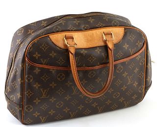Louis Vuitton Brown Monogram Coated Canvas Deauville Handbag, the exterior with an open pouch, brass hardware, vachetta leather accents, luggage tag a