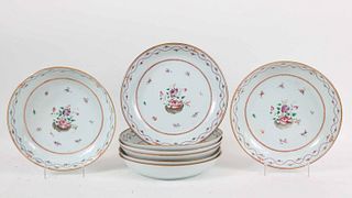 Eight Chinese Export Famille Rose Plates